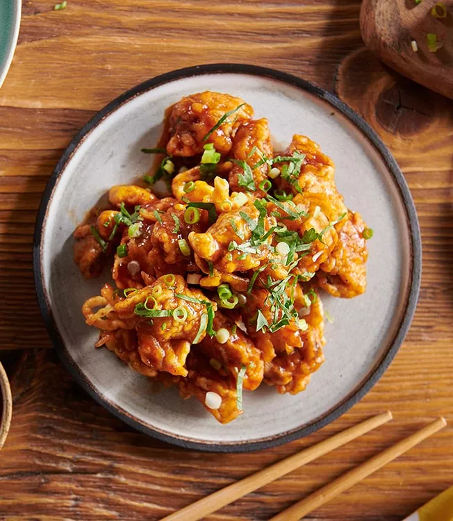 Chrupiące małże w stylu buffalo z polewą ponzu-chili